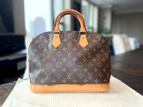 Louis Vuitton Alma Monogram Canvas Handbag Gold Hardware Handheld